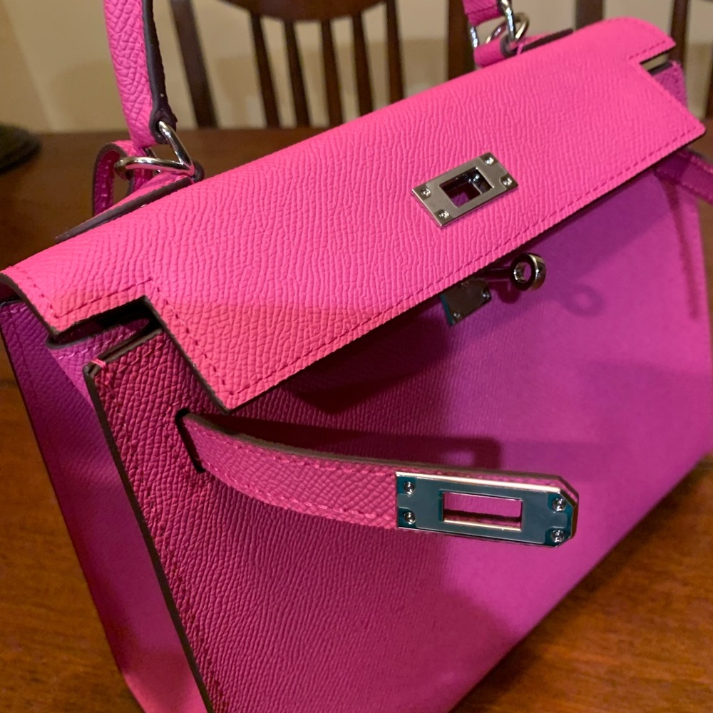 Brand new Absolutely stunning fuchsia real leather trendy purse size 25 w/ strap